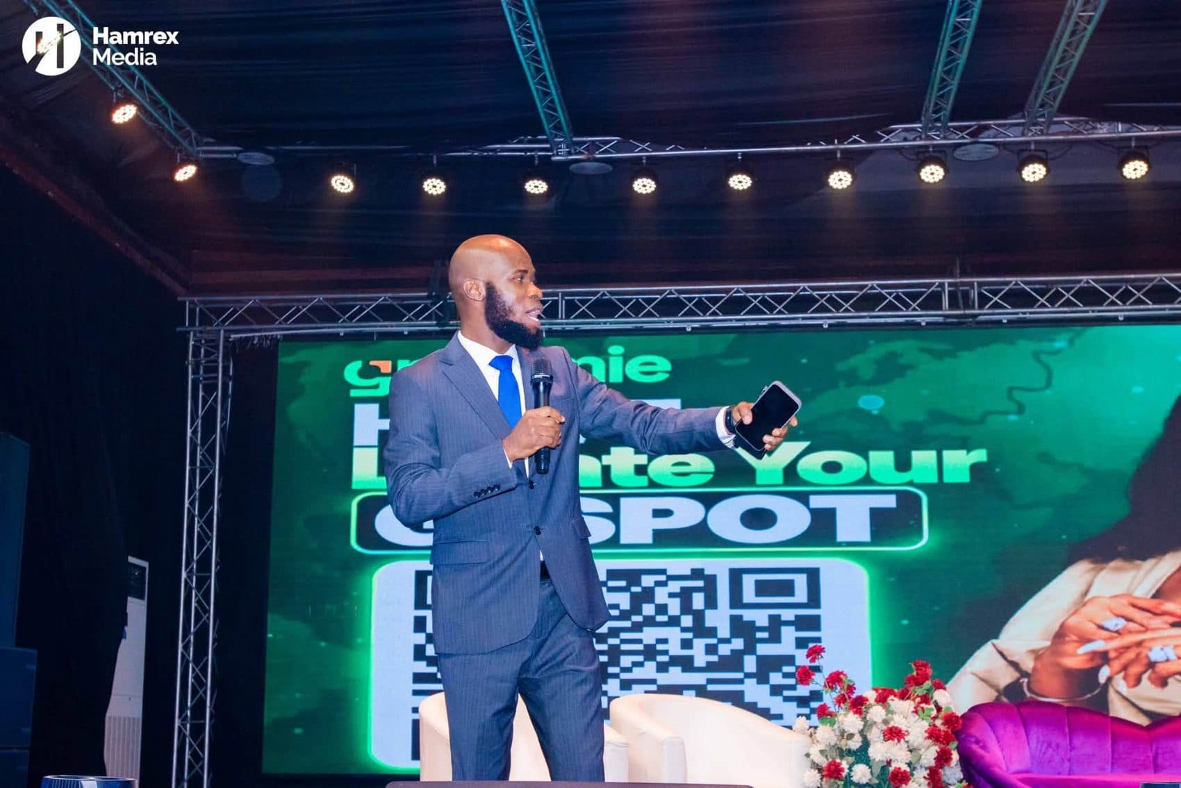 Dr. Amadi speaking on stage